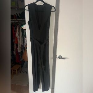 COS sleeveless black jumpsuit in size 4 (US)/ 36 (EU)